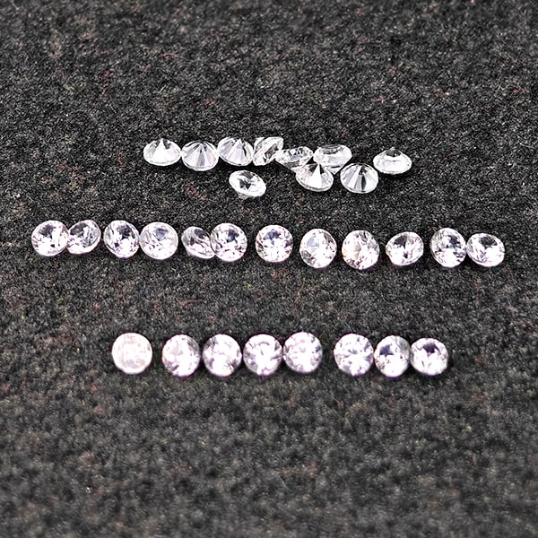 Natural White Zircon Gemstones 0.63 Ct. 30 Pcs Round Diamond Cut 1.5 Mm.: Product ID: 807743105 Product Name: Natural Zircon Weight: 0.63 CT. Size: 1.5 x 1.5 x 1.2 MM. Shape: Round Diamond Cut Color: White Clarity:VSI Luster: Good Gems Origin: Cambodia Treatment: Heated Cry