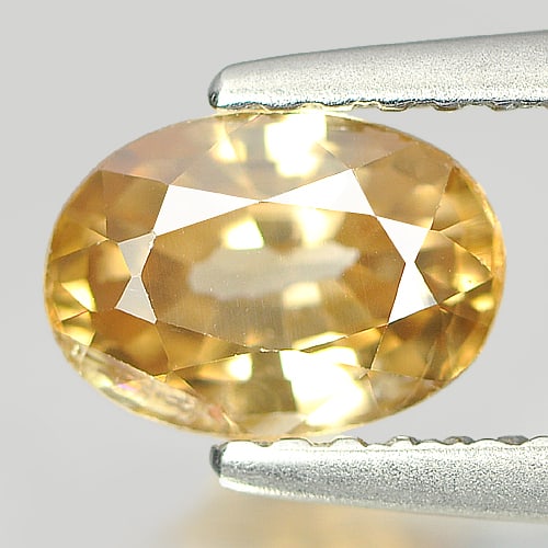Natural Light Yellow Zircon Gemstones 1.41 Ct. Oval Shape 7.2 x 5.2 Mm.: Product ID: 807727274 Product Name: Natural Zircon Weight: 1.41 CT. Size: 7.2 x 5.2 x 3.6 MM. Shape: Oval Color: Light Yellow Clarity:SI Luster: Good Gems Origin: Cambodia Treatment: Heated Crystal St