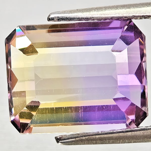 Natural Bi Color Ametrine Gemstones 3.34 Ct. Octagon Shape 10 x 7.9 Mm.: Product ID: 800408362 Product Name: Natural Ametrine Weight: 3.34 CT. Size: 10 x 7.9 x 5.6 MM. Shape: Octagon Color: Bi Color Clarity:VSI Luster: Good Gems Origin: Bolivia Treatment: Unheated Crystal 