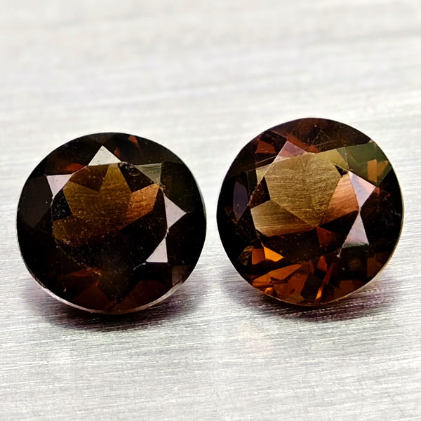 Natural Smokey Color Quartz Gemstones 1.30 Ct. 2 Pcs. Round Shape 5.8 Mm.: Product ID: 805529910 Product Name: Natural Quartz Weight: 1.30 CT. Size: 5.8 x 5.8 x 3.6 MM. Shape: Round Color: Smokey Clarity:VSI Luster: Good Gems Origin: Brazil Treatment: Unheated Crystal Struct
