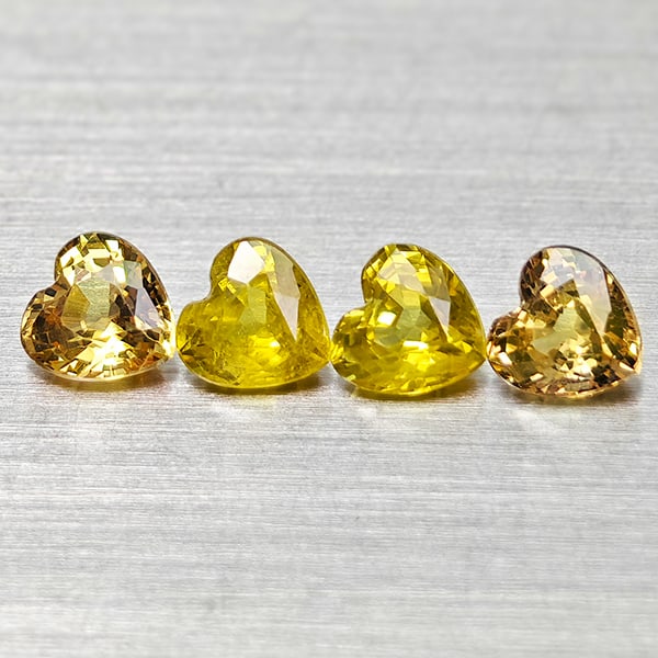 Natural Yellow Songea Sapphire Gemstones 1.47 Ct. 4 Pcs Heart Shape 4.1 Mm.: Product ID: 806162465 Product Name: Natural Yellow Sapphire Weight: 1.47 CT. Size: 4.1 x 4.1 x 2.7 MM. Shape: Heart Shape Color: Yellow Clarity:VSI Luster: Good Gems Origin: Tanzania Treatment: Heated