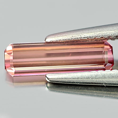 Natural Pink Tourmaline Gemstones 0.56 Ct. Octagon Shape 9.3 x 2.8 Mm.: Product ID: 807249072 Product Name: Natural Tourmaline Weight: 0.56 CT. Size: 9.3 x 2.8 x 2.3 MM. Shape: Octagon Color: Pink Clarity:VSI Luster: Good Gems Origin: Nigeria Treatment: Unheated Crystal S
