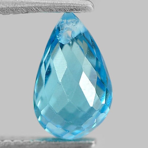 Natural Swiss Blue Topaz Gemstones 1.36 Ct. Briolette with Drilled Shape 7.8 x 4.5 Mm.: Product ID: 807164699 Product Name: Natural Blue Topaz Weight: 1.36 CT. Size: 7.8 x 4.5 x 4.5 MM. Shape: Briolette with Drilled Color: Swiss Blue Clarity:VSI Luster: Good Gems Origin: Brazil Treatment
