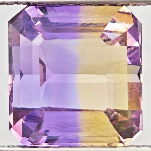 Natural Bi Color Ametrine Gemstones 5.41 Ct. Octagon Shape 9.8 x 9.4 Mm.: Product ID: 800408553 Product Name: Natural Ametrine Weight: 5.41 CT. Size: 9.8 x 9.4 x 7.6 MM. Shape: Octagon Color: Bi Color Clarity:VSI Luster: Good Gems Origin: Bolivia Treatment: Unheated Crystal