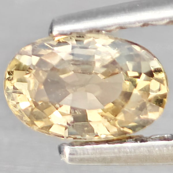 Natural Fancy Color Yellow Sapphire Gemstones 0.43 Ct. Oval Shape 5.5 x 3.7 Mm.: Product ID: 806162784 Product Name: Natural Sapphire Weight: 0.43 CT. Size: 5.5 x 3.7 x 2.7 MM. Shape: Oval Shape Color: Fancy Color Yellow Clarity:SI1 Luster: Good Gems Origin: Thailand Treatment: He