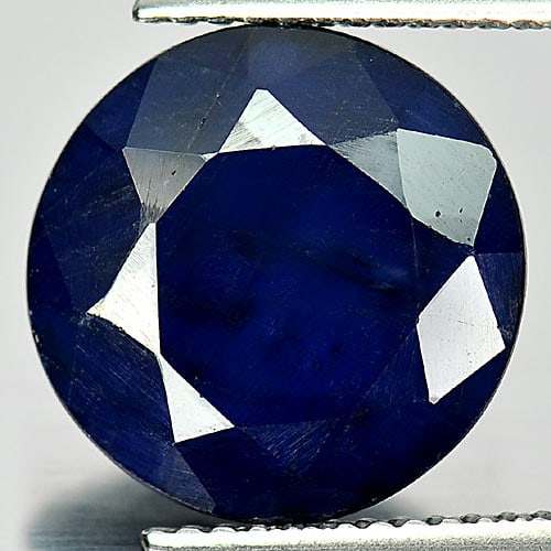 Natural Deep Blue Sapphire Gemstones 5.78 Ct. Round Shape 12.2 Mm.: Product ID: 806010583 Product Name: Natural Blue Sapphire Weight: 5.78 CT. Size: 12.2 x 12 x 4.2 MM. Shape: Round Color: Deep Blue Clarity:Semi - Transparent Luster: Good Gems Origin: Madagascar Treat