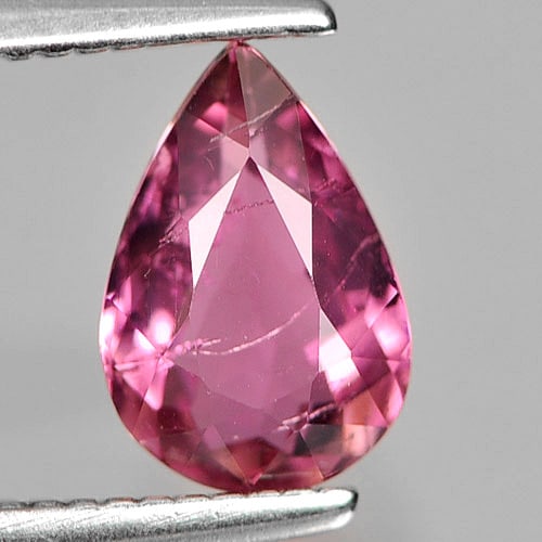 Natural Pink Tourmaline Gemstones 0.71 Ct. Pear Shape 7.6 x 4.1 Mm.: Product ID: 807246864 Product Name: Natural Tourmaline Weight: 0.71 CT. Size: 7.6 x 4.1 x 2.9 MM. Shape: Pear Color: Pink Clarity:VSI Luster: Good Gems Origin: Nigeria Treatment: Unheated Crystal Stru