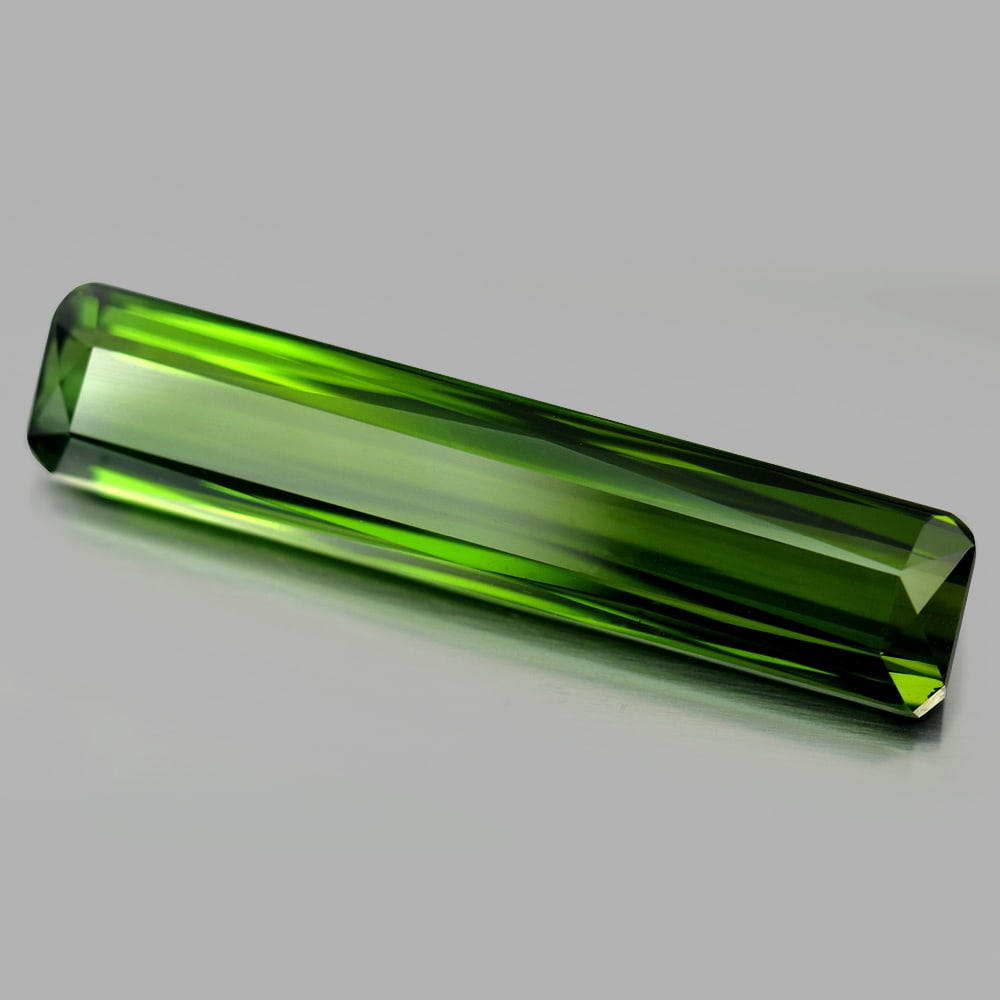 Natural Green Tourmaline Gemstones 15.53 Ct. Clean Octagon Shape 35 x 7.6 Mm.: Product ID: 807216371 Product Name: Natural Tourmaline Weight: 15.53 CT. Size: 35 x 7.6 x 5.6 MM. Shape: Octagon Color: Green Clarity:IF Luster: Very Good Gems Origin: Nigeria Treatment: Unheated Crys