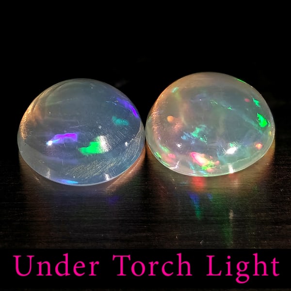 Natural Multi Color Opal Gemstones 1.29 Ct. 2 Pcs Round Cabochon Shape 6.9 Mm.: Product ID: 818728156 Product Name: Natural Opal Weight: 1.29 CT. Size: 6.9 x 6.9 x 3 MM. Shape: Round Cabochon Color: Multi-Color Clarity:Semi - Transparent Luster: Good Gems Origin: Ethiopia Treatme