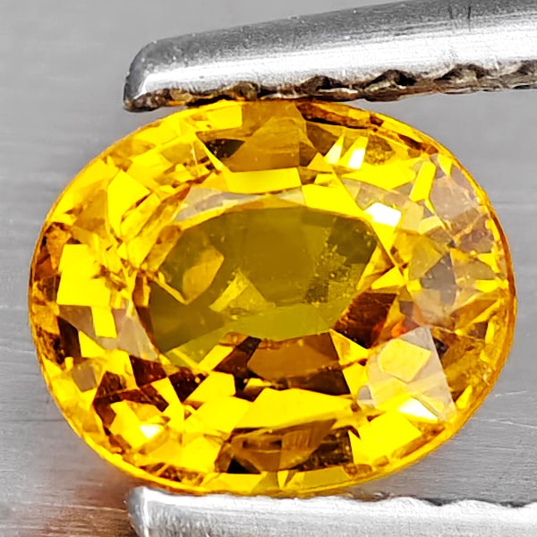 Natural Yellow Sapphire Gemstones 0.69 Ct. Clean Oval Shape 5.9 x 4.8 Mm.: Product ID: 806163035 Product Name: Natural Yellow Sapphire Weight: 0.69 CT. Size: 5.9 x 4.8 x 3 MM. Shape: Oval Color: Yellow Clarity:VSI Luster: Good Gems Origin: Thailand Treatment: Heated Crystal 