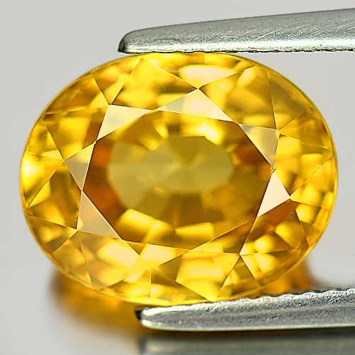 Natural Yellow Zircon Gemstones 9.53 Ct. Clean Oval Shape 12.5 x 10 Mm.: Product ID: 807722385 Product Name: Natural Zircon Weight: 9.53 CT. Size: 12.5 x 10 x 7.1 MM. Shape: Oval Color: Yellow Clarity:IF Luster: Very Good Gems Origin: Cambodia Treatment: Heated Crystal Str