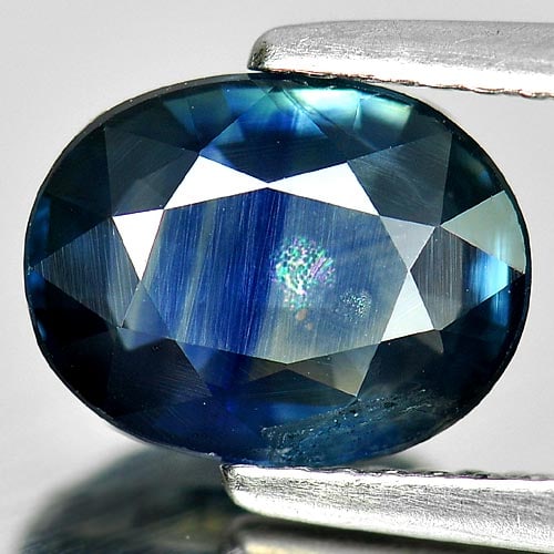 Natural Blue Sapphire Gemstones 2.50 Ct. Oval Shape 9 x 7 Mm.: Product ID: 806151623 Product Name: Natural Blue Sapphire Weight: 1.48 CT. Size: 9 x 7 x 4 MM. Shape: Oval Color: Blue Clarity:SI1 Luster: Good Gems Origin: Thailand Treatment: Heated Crystal Structur