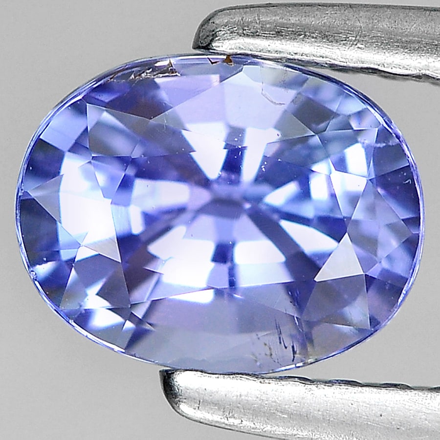 Natural Blue Tanzanite Gemstones 1.10 Ct. Oval Shape 6.87 x 5.39 Mm.: Product ID: 807004167 Product Name: Natural Tanzanite Weight: 1.10 CT. Size: 6.87 x 5.39 x 4.11 MM. Shape: Oval Color: Violetish Blue Clarity:VSI Luster: Very Good Gems Origin: Tanzania Treatment: Hea