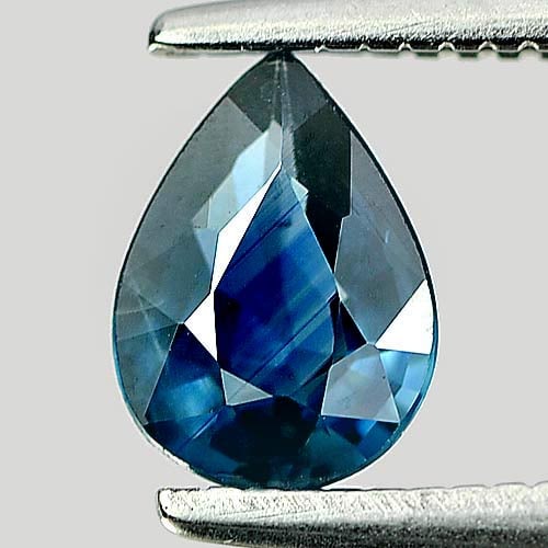 Natural Blue Sapphire Gemstones 0.61 Ct. Pear Shape 6.7 x 4.9 Mm.: Product ID: 806155936 Product Name: Natural Blue Sapphire Weight: 0.61 CT. Size: 6.7 x 4.9 x 2.5 MM. Shape: Pear Color: Blue Clarity:VSI Luster: Good Gems Origin: Thailand Treatment: Heated Crystal St