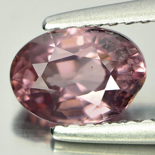 Natural Imperial Pink Zircon Gemstones 1.41 Ct. Oval Shape 7.4 x 5.4 Mm.: Product ID: 807719651 Product Name: Natural Zircon Weight: 1.41 CT. Size: 7.4 x 5.4 x 3.9 MM. Shape: Oval Color: Imperial Pink Clarity:SI Luster: Good Gems Origin: Tanzania Treatment: Unheated Crystal