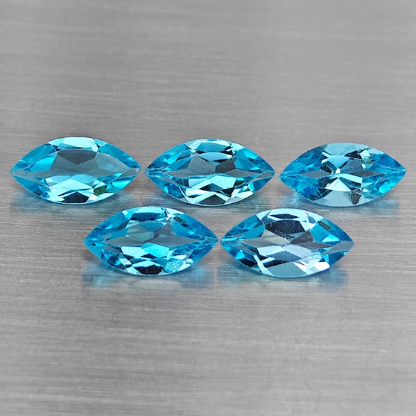 Natural Swiss Blue Topaz Gemstones 7.46 Ct. 5 Pcs Marquise Shape 10 x 5.2 Mm.: Product ID: 807168720 Product Name: Natural Blue Topaz Weight: 7.46 CT. Size: 10 x 5.2 x 3.4 MM. Shape: Marquise Shape Color: Swiss Blue Clarity:VSI Luster: Good Gems Origin: Brazil Treatment: Treated