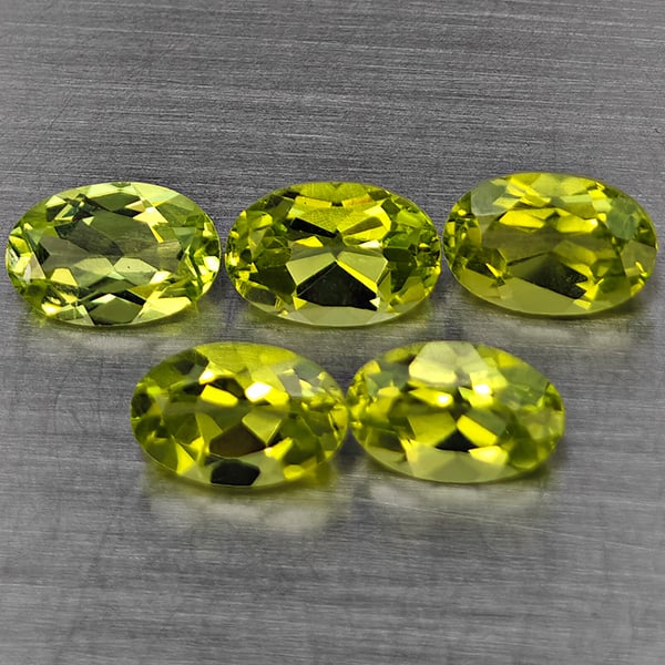 Natural Green Peridot Gemstones 2.80 Ct. 5 Pcs Oval Shape 6 x 4.2 Mm.: Product ID: 805317746 Product Name: Natural Peridot Weight: 2.80 CT. Size: 6 x 4.2 x 3.4 MM. Shape: Oval Shape Color: Green Clarity:VSI Luster: Good Gems Origin: Pakistan Treatment: Unheated Crystal S