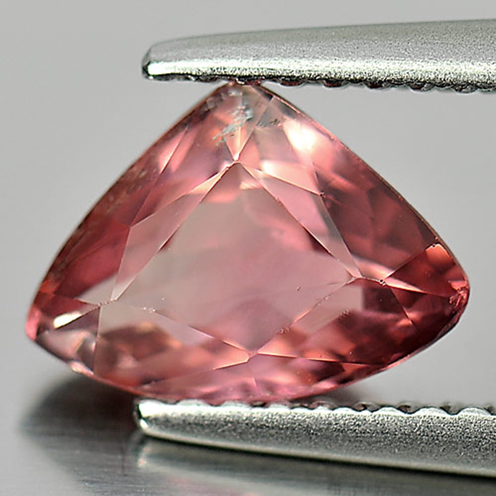 Natural Peach Pink Tourmaline Gemstones 1.18 Ct. Trilliant Shape 8.8 x 6.4 Mm.: Product ID: 807244056 Product Name: Natural Tourmaline Weight: 1.18 CT. Size: 8.8 x 6.4 x 3.8 MM. Shape: Trilliant Color: Peach Pink Clarity:VSI Luster: Good Gems Origin: Nigeria Treatment: Unheated C