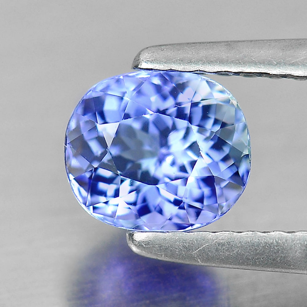 Natural Blue Tanzanite Gemstones 1.17 Ct. Clean Oval Shape 6.30 x 5.47 Mm.: Product ID: 807005228 Product Name: Natural Tanzanite Weight: 1.17 CT. Size: 6.30 x 5.47 x 4.65 MM. Shape: Oval Color: Violetish Blue Clarity:IF Luster: Very Good Gems Origin: Tanzania Treatment: Heat
