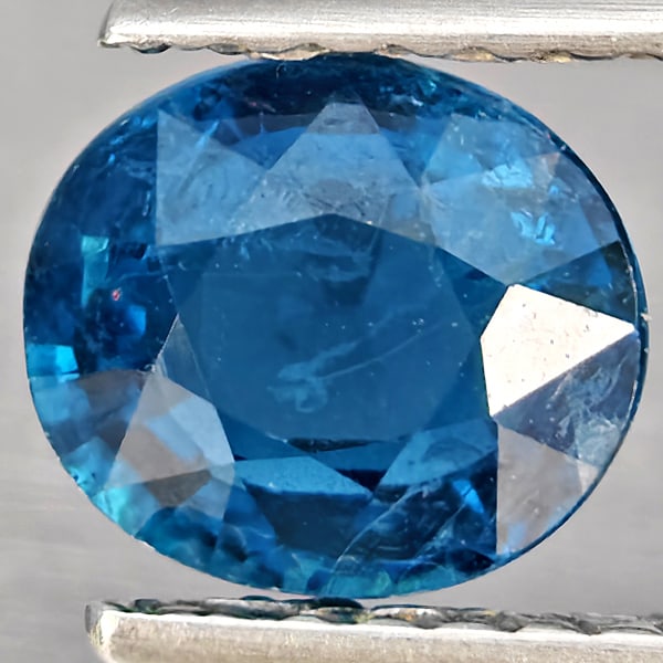 Natural Blue Indicolite Tourmaline Gemstones 1.15 Ct. Oval Shape 6.6 x 5.9 Mm.: Product ID: 807251183 Product Name: Natural Gemstones Weight: 1.15 CT. Size: 6.6 x 5.9 x 3.8 MM. Shape: Oval Color: Blue Indicolite Clarity:VSI Luster: Good Gems Origin: Nigeria Treatment: Unheated Cr