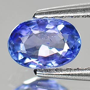 Natural Blue Tanzanite Gemstones 0.50 Ct. Oval Shape 5.9 x 4.1 Mm.: Product ID: 807008331 Product Name: Natural Tanzanite Weight: 0.50 CT. Size: 5.9 x 4.1 x 2.7 MM. Shape: Oval Color: Violetish Blue Clarity:VSI - SI Luster: Good Gems Origin: Tanzania Treatment: Heated