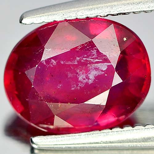 Natural Purplish Red Ruby Gemstones 1.98 Ct. Oval Shape 8.1 x 6.3 Mm.: Product ID: 805927755 Product Name: Natural Ruby Weight: 1.98 CT. Size: 8.1 x 6.3 x 3.8 MM. Shape: Oval Color: Purplish Red Clarity:VSI Luster: Good Gems Origin: Madagascar Treatment: Heated (Lead-gla