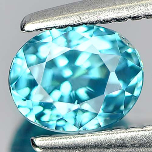 Natural Blue Zircon Gemstones 1.00 Ct. Oval Shape 5.4 x 4.4 Mm.: Product ID: 807712159 Product Name: Natural Zircon Weight: 1.00 CT. Size: 5.4 x 4.4 x 4 MM. Shape: Oval Color: Blue Clarity:IF Luster: Good Gems Origin: Cambodia Treatment: Heated Crystal Structure: T