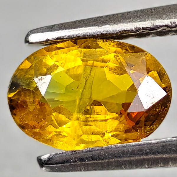 Natural Yellow Sapphire Gemstones 0.81 Ct. Oval Shape 6.7 x 4.8 Mm.: Product ID: 806162558 Product Name: Natural Yellow Sapphire Weight: 0.81 CT. Size: 6.7 x 4.8 x 3 MM. Shape: Oval Color: Yellow Clarity:VSI - SI1 Luster: Good Gems Origin: Thailand Treatment: Heated Cr