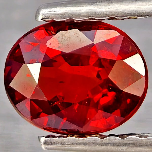 Natural Orangish Red Spessartine Garnet Gemstones 0.93 Ct. Oval Shape 6.1 x 4.9 Mm.: Product ID: 802937378 Product Name: Natural Garnet Weight: 0.93 CT. Size: 6.1 x 4.9 x 3.4 MM. Shape: Oval Shape Color: Orangish Red Clarity:SI1 Luster: Good Gems Origin: Namibia Treatment: Unheated Cr