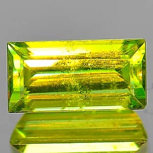 Natural Intense Green Titanium Sphene Gemstones With Rainbow Spark 1.17 Ct. Baguette Shape 8.1 x 4.1: Product ID: 806506717 Product Name: Natural Sphene Weight: 1.17 CT. Size: 8.1 x 4.1 x 3.3 MM. Shape: Baguette Color: Green With Rainbow Spark Clarity:SI Luster: Adamantine Gems Origin: Madagascar Trea