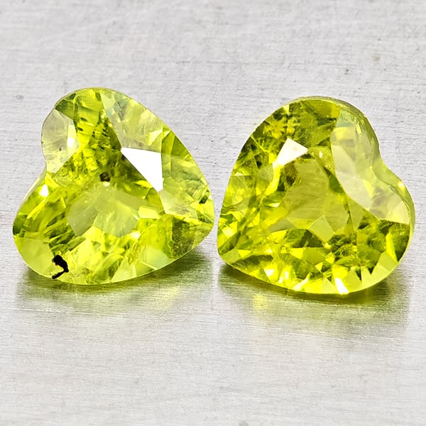 Natural Green Peridot Gemstones 1.83 Ct. 2 Pcs Heart Shape 5.9 x 5.9 Mm.: Product ID: 805317340 Product Name: Natural Peridot Weight: 1.83 CT. Size: 5.9 x 5.9 x 3.9 MM. Shape: Heart Shape Color: Green Clarity:VSI - SI1 Luster: Good Gems Origin: Pakistan Treatment: Unheated 