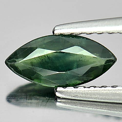 Natural Green Sapphire Gemstones 0.71 Ct. Marquise Shape 8.6 x 4.2 Mm.: Product ID: 806158889 Product Name: Natural Green Sapphire Weight: 0.71 CT. Size: 8.6 x 4.2 x 2.3 MM. Shape: Marquise Color: Green Clarity:VSI Luster: Good Gems Origin: Thailand Treatment: Heated Crys