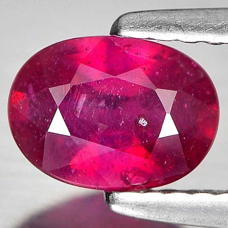 Natural Purplish Red Ruby Gemstones 1.11 Ct. Oval Shape 7.2 x 5 Mm.: Product ID: 805934869 Product Name: Natural Ruby Weight: 1.11 CT. Size: 7.2 x 5 x 3.2 MM. Shape: Oval Color: Red Clarity:SI1 Luster: Good Gems Origin: Madagascar Treatment: Heated (Lead glass fillin C