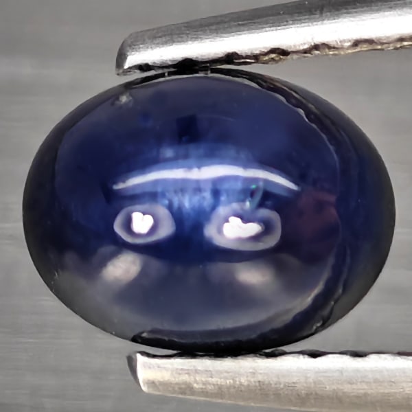 Natural Blue Sapphire Gemstones 1.67 Ct. Oval Cabochon Shape 7.2 x 5.5 Mm.: Product ID: 806008347 Product Name: Natural Blue Sapphire Weight: 1.67 CT. Size: 7.2 x 5.5 x 4.1 MM. Shape: Oval Cabochon Color: Blue Clarity:Opaque Luster: Good Gems Origin: Madagascar Treatment: Hea