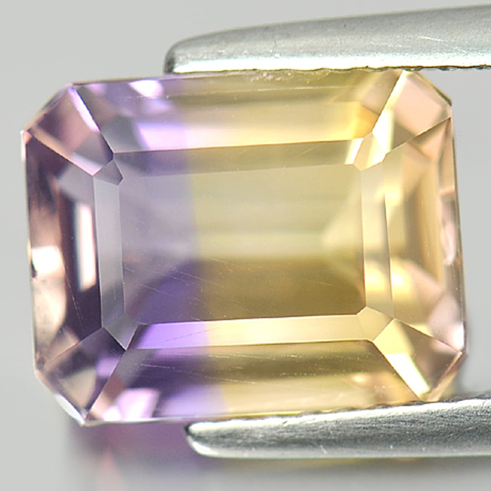 Natural Bi Color Ametrine Gemstones 4.57 Ct. VVS Octagon Shape 10.5 x 8.3 Mm.: Product ID: 800405042 Product Name: Natural Ametrine Weight: 4.57 CT. Size: 10.5 x 8.3 x 6.5 MM. Shape: Octagon Color: Bi Color Clarity:VVS Luster: Good Gems Origin: Bolivia Treatment: Unheated Crysta
