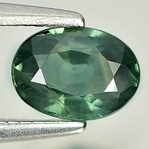 Natural Green Sapphire Gemstones 0.68 Ct. Oval Shape 6.2 x 4.5 Mm.: Product ID: 806157855 Product Name: Natural Green Sapphire Weight: 0.68 CT. Size: 6.2 x 4.5 x 2.7 MM. Shape: Oval Color: Green Clarity:VSI Luster: Good Gems Origin: Thailand Treatment: Heated Crystal 