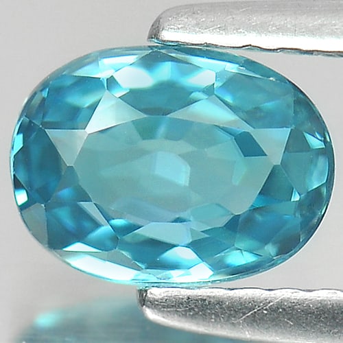 Natural Blue Zircon Gemstone 1.39 Ct. VVS Oval Shape 7 x 5.2 Mm.: Product ID: 807722291 Product Name: Natural Zircon Weight: 1.39 CT. Size: 7 x 5.2 x 3.1 MM. Shape: Oval Color: Blue Clarity:VVS Luster: Good Gems Origin: Cambodia Treatment: Heated Crystal Structure: 