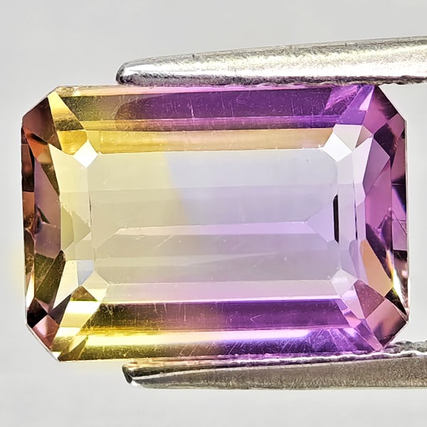 Natural Bi Color Ametrine Gemstones 2.69 Ct. Octagon Shape 10.7 x 7.6 Mm.: Product ID: 800408280 Product Name: Natural Ametrine Weight: 2.69 CT. Size: 10.7 x 7.6 x 4.3 MM. Shape: Octagon Color: Bi Color Clarity:VSI Luster: Good Gems Origin: Bolivia Treatment: Unheated Crysta