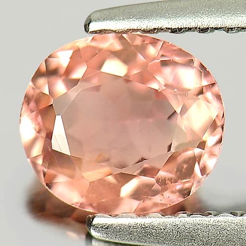 Natural Pinkish Peach Tourmaline Gemstones 0.79 Ct. Oval Shape 6.3 x 5.6 Mm.: Product ID: 807245946 Product Name: Natural Tourmaline Weight: 0.79 CT. Size: 6.3 x 5.6 x 3.3 MM. Shape: Oval Color: Pinkish Peach Clarity:SI1 Luster: Good Gems Origin: Nigeria Treatment: Unheated Cry