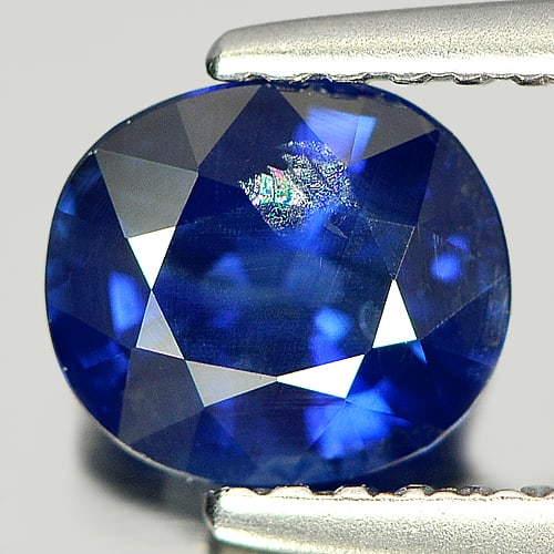 Natural Blue Sapphire Gemstones 1.16 Ct. Oval Shape 6.46 x 5.67 Mm.: Product ID: 806005603 Product Name: Natural Blue Sapphire Weight: 1.16 CT. Size: 6.46 x 5.67 x 3.67 MM. Shape: Oval Color: Blue Clarity:SI Luster: Good Gems Origin: Thailand Treatment: Heated Crystal 