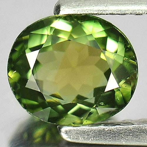 Natural Yellowish Green Tourmaline Gemstones 0.92 Ct. Clean Oval Shape 6.7 x 5.8 Mm.: Product ID: 807246370 Product Name: Natural Tourmaline Weight: 0.92 CT. Size: 6.7 x 5.8 x 3.5 MM. Shape: Oval Color: Yellowish Green Clarity:VVS Luster: Good Gems Origin: Nigeria Treatment: Unheated C