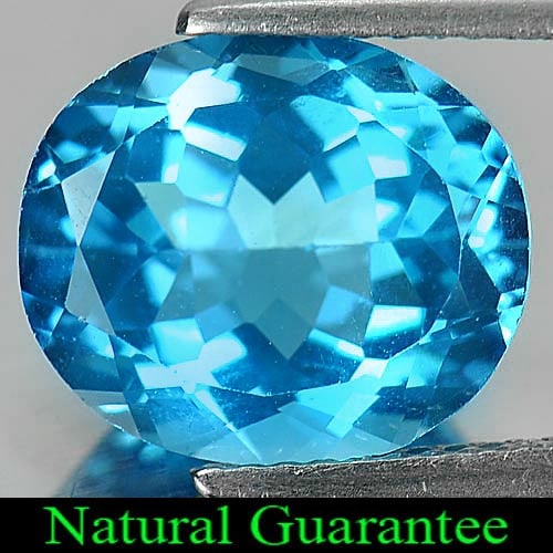 Natural Swiss Blue Topaz Gemstones 5.44 Ct. Clean Oval Shape 12 x 10 Mm.: Product ID: 807161097 Product Name: Natural Blue Topaz Weight: 5.44 CT. Size: 12 x 10 x 6.2 MM. Shape: Oval Color: Swiss Blue Clarity:VSI Luster: Good Gems Origin: Brazil Treatment: Treated Crystal St