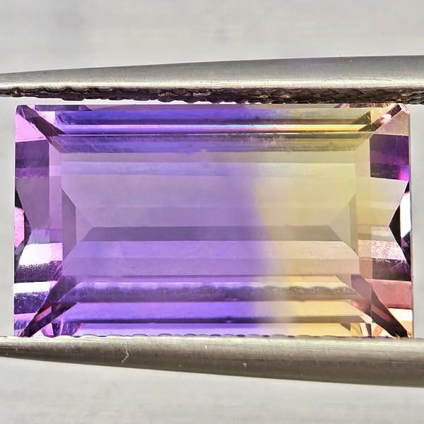 Natural Bi Color Ametrine Gemstones 6.08 Ct. Baguette Shape 13.6 x 8.4 Mm.: Product ID: 800408563 Product Name: Natural Ametrine Weight: 6.08 CT. Size: 13.6 x 8.4 x 6.5 MM. Shape: Baguette Color: Bi Color Clarity:VSI Luster: Good Gems Origin: Bolivia Treatment: Unheated Cryst