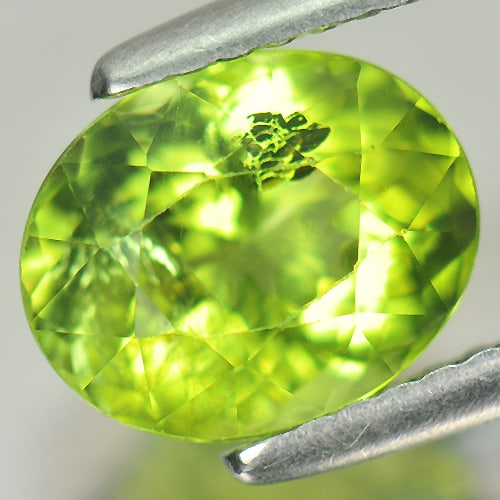 Natural Green Peridot Gemstones 2.29 Ct. Oval Shape 8.6 x 7 Mm.: Product ID: 805310033 Product Name: Natural Peridot Weight: 2.29 CT. Size: 8.6 x 7 x 5.4 MM. Shape: Oval Color: Green Clarity:SI Luster: Good Gems Origin: China Treatment: Unheated Crystal Structure: 
