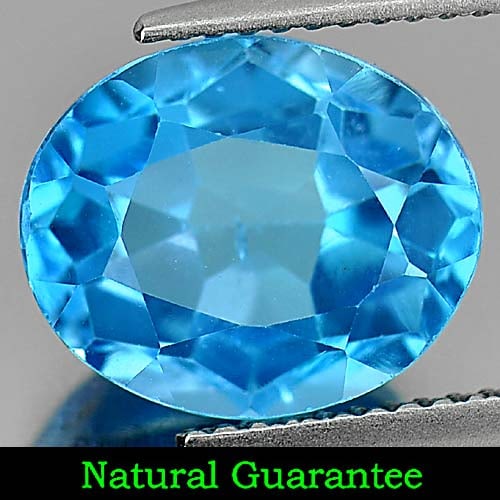 Natural Swiss Blue Topaz Gemstones 6.39 Ct. Clean Oval Shape 12 x 10 Mm.: Product ID: 807161174 Product Name: Natural Blue Topaz Weight: 6.39 CT. Size: 12 x 10 x 7 MM. Shape: Oval Color: Swiss Blue Clarity:VSI Luster: Good Gems Origin: Brazil Treatment: Treated Crystal Stru