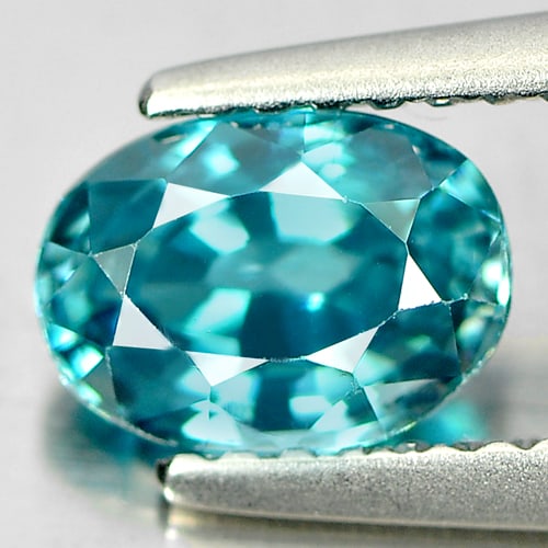 Natural Blue Zircon Gemstones 1.53 Ct. Clean Oval Shape 7.1 x 5.1 Mm.: Product ID: 807720888 Product Name: Natural Zircon Weight: 1.53 CT. Size: 7.1 x 5.1 x 3.9 MM. Shape: Oval Color: Blue Clarity:IF Luster: Very Good Gems Origin: Cambodia Treatment: Heated Crystal Struc