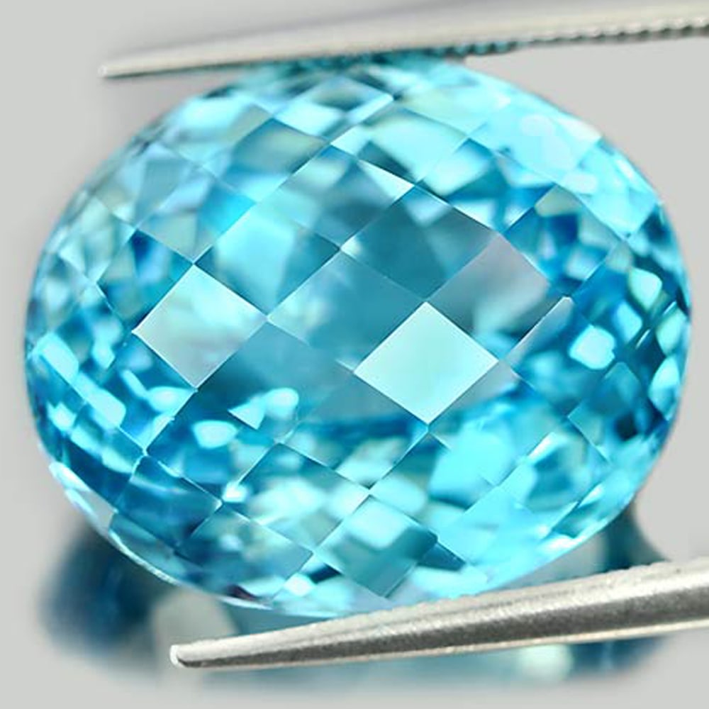 Natural Swiss Blue Topaz Gemstones 25.31 Ct. VVS Oval Checkerboard 18.7 x 15.8 Mm.: Product ID: 807158656 Product Name: Natural Blue Topaz Weight: 25.31 CT. Size: 18.7 x 15.8 x 11.8 MM. Shape: Oval Checkerboard Color: Blue Clarity:VVS Luster: Very Good Gems Origin: Brazil Treatment: 