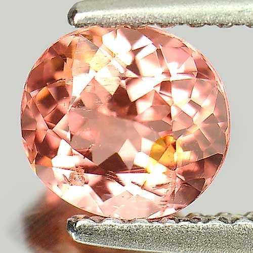 Natural Orange Peach Tourmaline Gemstones 0.86 Ct. Oval Shape 6.2 x 5.8 Mm.: Product ID: 807245955 Product Name: Natural Tourmaline Weight: 0.86 CT. Size: 6.2 x 5.8 x 3.8 MM. Shape: Oval Color: Orange Peach Clarity:SI1 Luster: Good Gems Origin: Nigeria Treatment: Unheated Crys