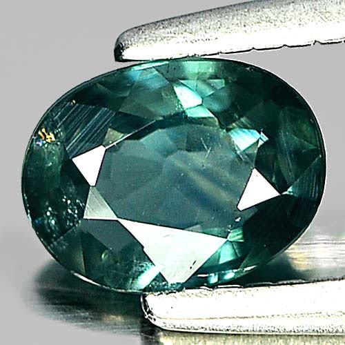 Natural Bluish Green Sapphire Gemstones 0.55 Ct. Oval Shape 5.7 x 4.4 Mm.: Product ID: 806159078 Product Name: Natural Green Sapphire Weight: 0.55 CT. Size: 5.7 x 4.4 x 2.4 MM. Shape: Oval Color: Bluish Green Clarity:VSI Luster: Good Gems Origin: Thailand Treatment: Heated C