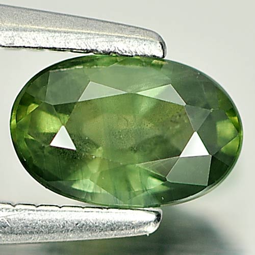 Natural Yellowish Green Sapphire Gemstones 0.60 Ct. Oval Shape 6.1 x 4 Mm.: Product ID: 806157856 Product Name: Natural Green Sapphire Weight: 0.60 CT. Size: 6.1 x 4 x 2.8 MM. Shape: Oval Color: Yellowish Green Clarity:VSI Luster: Good Gems Origin: Thailand Treatment: Heated 